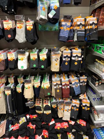 Frankfurt, Germany - Dec 27, 2019: Multiple socks for men women for sale manufactured by NurDen and other brands in German supermarketsのeditorial素材