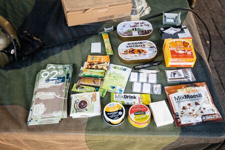 Strasbourg, France - Sep 21, 2019: Multiple dried and liquid food special pack prepared for military interventions - overhead view open days of French army in city centerのeditorial素材