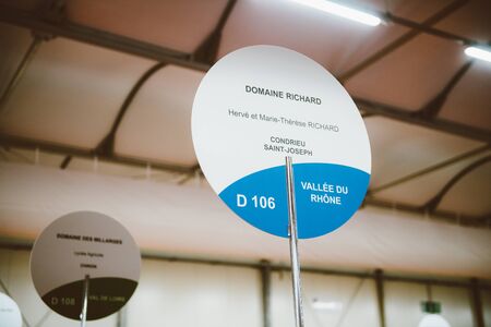 Strasbourg, France - Feb 16, 2020: Sign of Domaine Richard from Vallee du Rhone at the Vignerons independant English: Independent winemakers of France wine fair for private and horeca customersのeditorial素材
