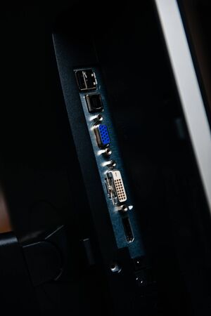 Close-up macro view of modern computer PC monitor with multiple ports entrance - USB, VGA, DVI and Displayport connectionsの写真素材