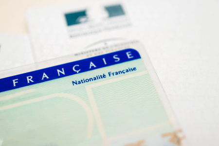 Paris, France - Mar 31, 2019: Tilt Shift lens close-up macro shot of National identity card Carte...