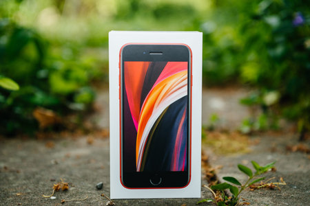 Paris, France - Apr 24, 2020: Front view of the new budget iPhone SE by Apple Computers touch ID,...