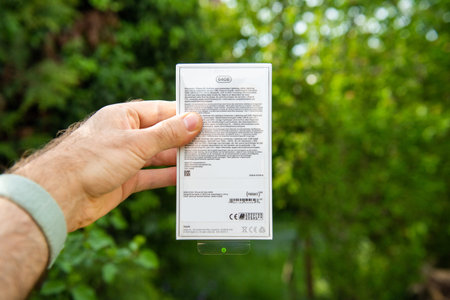 Paris, France - Apr 24, 2020: Content of the package of new budget iPhone SE by Apple Computers...