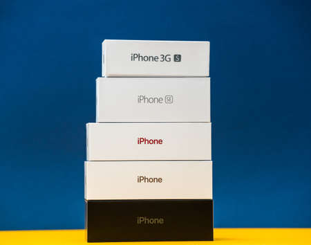 Paris, France - Apr 26, 2020: Stack of multiple packages cardboards of Apple Computers iphone smartphpone iPhone 3gs, SE 2016, SE 2020, XS and 11 Pro with triple cameras - vintage and new collectionのeditorial素材