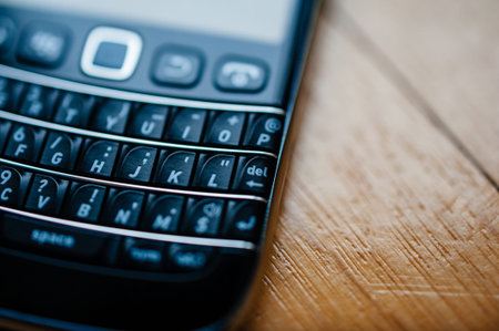London, United Kingdom - Apr 21, 2013: Close-up macro shot of keys on keyboard on vintage Blackberry...