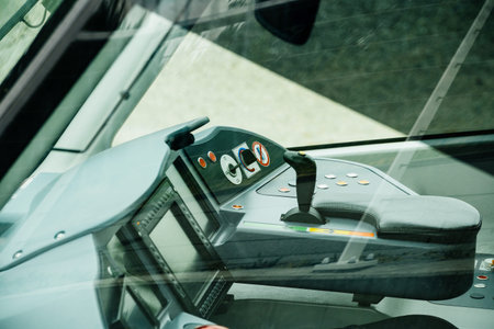 Strasbourg, France - May 9, 2020: Interior view of Alstom tramway cockpit withy multiple knobs and...