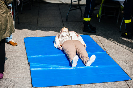 Fire and rescue duty training manikins dummy with rescue emergency team nearby during a general...