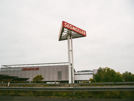 Germany - Nov 14, 2018: tall street advertising signage pole with Segmuller logotype the large furniture storeのeditorial素材
