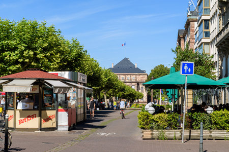 Strasbourg, France - July 29, 2017: Central Place Broglie in Alsatian capital with Bertani crepes cafe and Opera du Rhin in the background on a warm summer dayのeditorial素材