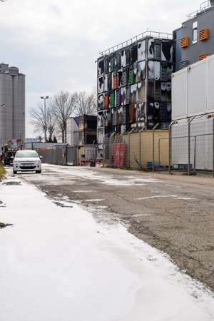 Strasbourg, France - Mar 10, 2021: Firefighters foam and burnt remains of the large data center - Millions of websites offline after fire at French cloud services firm OVH Cloud in Strasbourg Franceのeditorial素材