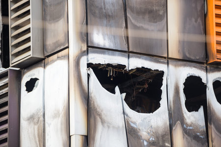 Strasbourg, France - Mar 10, 2021: Firber cables and burnt remains of the large data center -...