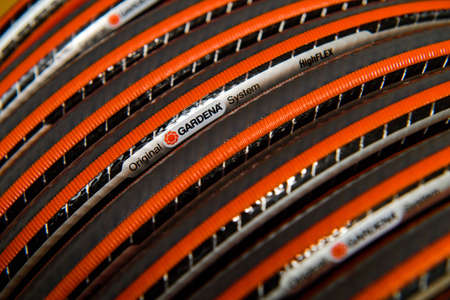 Paris, France - MAr 8, 2021: Close-up macro shot of the genotype of Gardena garden equipment on a High Flex Original hoseのeditorial素材