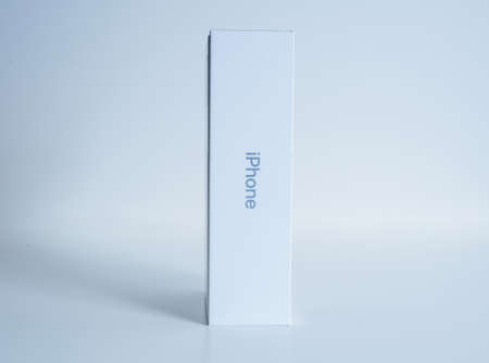 Side view of new cardboard package of latest Apple Computers iPhone smartphoneのeditorial素材