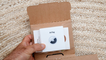 AirTag Unboxing unpacking process finder by Apple Computersのeditorial素材