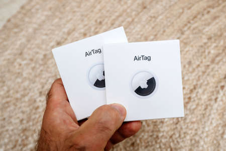 AirTag Unboxing unpacking process finder by Apple Computersのeditorial素材