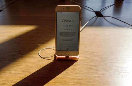 recently launched Apple Computers iphone telephone with display showing 64 gb and 256 gb pricesのeditorial素材