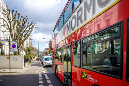 London double-decker bred bus and Needham Road streetのeditorial素材