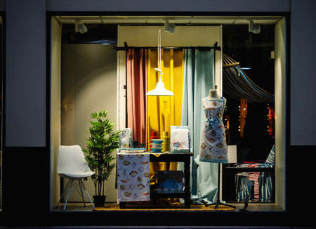 arranged showcase of a store selling diverse house decoration itemsの写真素材