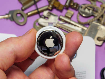 AirTag and iphone with multiple keys in backgroundのeditorial素材