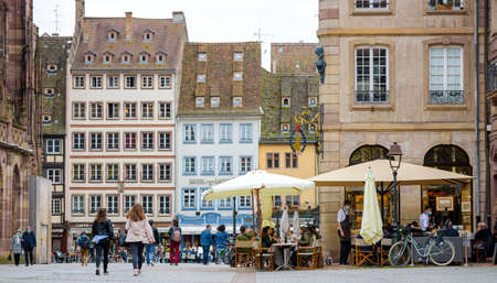 People locals and toursits wlaking near bars and restaurants terraces as they reopenのeditorial素材