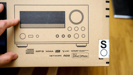 new package for mini hi-fi component audi system with Compact Disc logotype, mp3, wma, usb, vls and ready for iPod and iphoneのeditorial素材