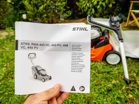 Stihl RMA 443 PV VC 448 lawn mower instruction manual with the product in backgroundのeditorial素材