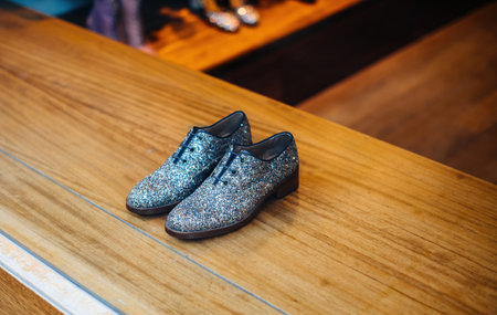 Covered with multiple crystals pair of show in the showcase of luxury store in central Barcelonの写真素材