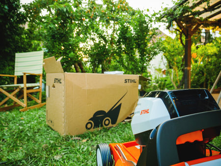 Unboxing process in the garden for Stihl battery operated lawn mowerのeditorial素材