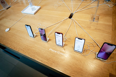 Directly above view of iPhone 13 Mini version smartphone model by Apple Computers