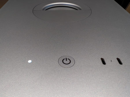 Power button on the new Mac Pro workstation by Apple Computers with two thunderbolt usb-c...