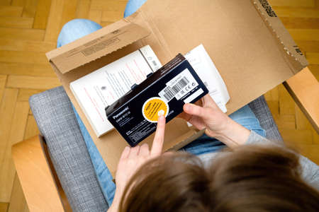 Amazon Prime Parcel delivery of e-commerce ordered goods - warehouse deals used item stickerのeditorial素材