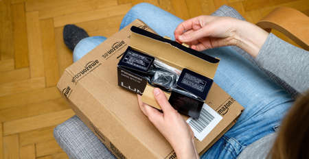 Amazon Prime Parcel delivery of e-commerce ordered goods via internet Panasonic Lumix DMW-BTC10 charger for mirrorles cameraのeditorial素材