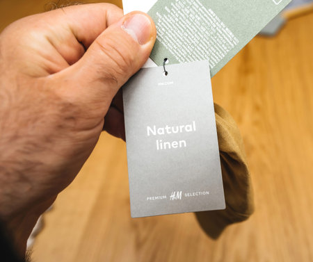 natural linen premium selection sign manufactured by the H and M Hennes and Mauritz AB Swedish multinational clothing-retail companyのeditorial素材