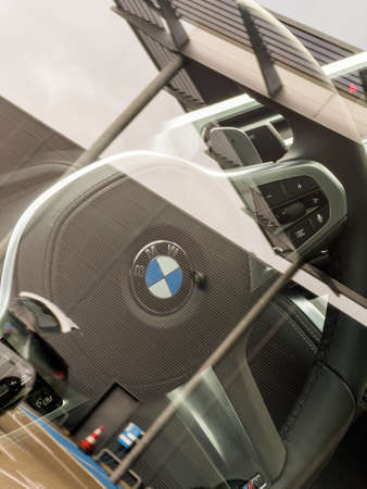 View through window of new luxury BMW car steering wheelのeditorial素材