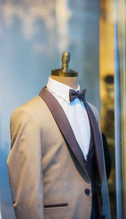 Male suit tuxedo defocused background on mannequin in the living roomの写真素材
