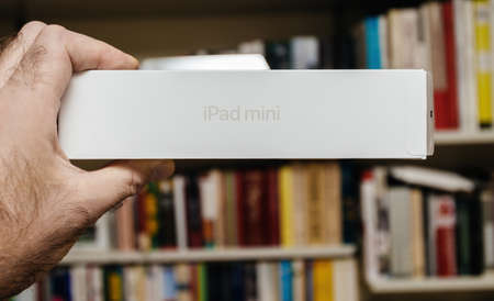 Amazon Prime cardboard box the new sixth-generation Apple Computers iPad Mini tablet - looking rear thin packageのeditorial素材