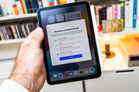Welcome to Apple Pencil message on new sixth-generation Apple Computers iPad Mini tablet during first setup installation unboxingのeditorial素材