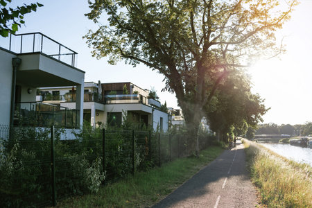 Multiple French apartment buildings properties real estate with cyclists