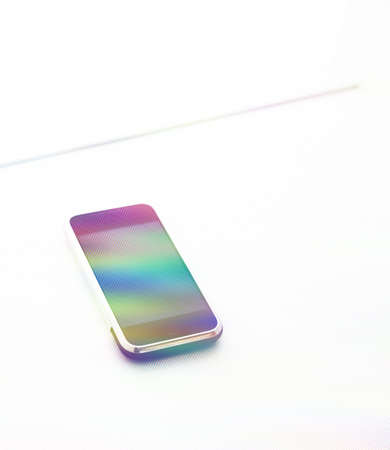 Smartphone in metaverse generation on blue white pure tableの写真素材