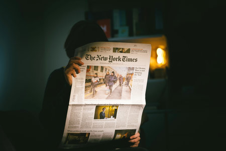 The New York with headlines Russian president Vladimir Putin after signing recognition of Donbass...