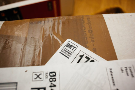 Close-up macro of the sticker on parcel from with BRT espresso formerly Bartolini S.p.A. the Italian...