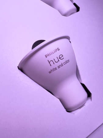 Close-up macro shot of new Philips Hue GU10 bulb with white and color capabilities - smart illumination controlled by smartphones, computers and voice assistantsのeditorial素材