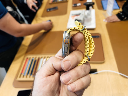 Apple Store first day of sale for new titanium Apple Watch Ultra designed for extreme activities - man holding the new ocean bandのeditorial素材