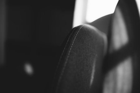 photo of armchair armrest sewn with white threadの写真素材