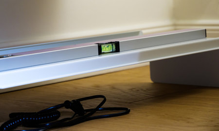 Close-up of Vitsoe bubble spirit level on the 606 shelvesのeditorial素材