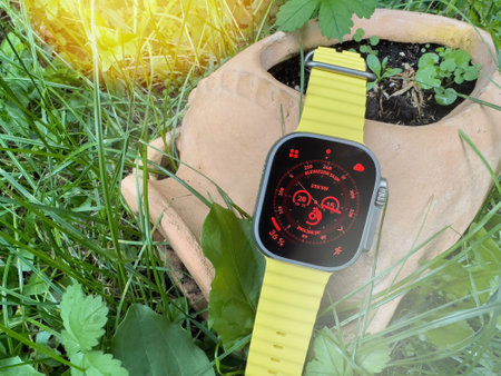 Ceramic greek decoration in garden with Night Mode for better viewing in low light situations of new titanium Apple Watch Ultra designed for extreme activities like endurance sports, elite athletesのeditorial素材