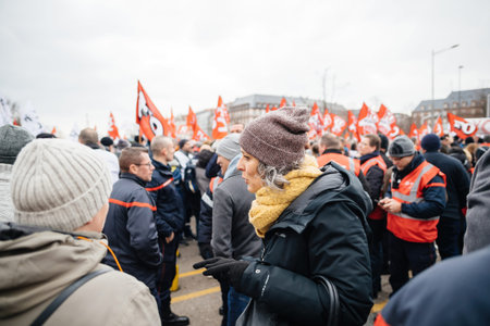 Adult woman talking at protest retirement age in France