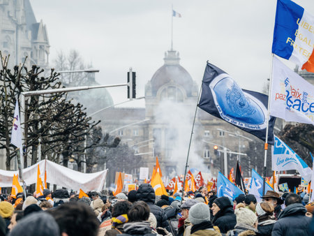 Smoke greande flags and placards - second demonstration against the new pension reform to be presented next month by French Prime Minister Elisabeth Borneのeditorial素材