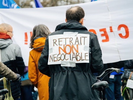 retirement is not negociable palcard at second demonstration against the new pension reform to be presented next month by French Prime Minister Elisabeth Borneのeditorial素材