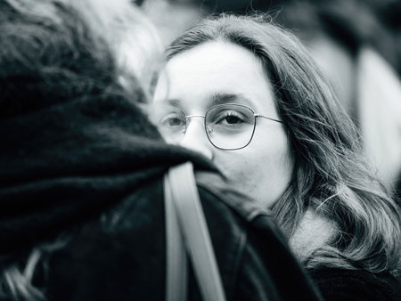 Black and white portarit of woman at second demonstration againsのeditorial素材